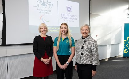 UQ VC Deborah Terry, Paralympian and UQ student Lakeisha Patterson, and Paralympics Australia CEO Catherine Clark Three women standing in front of a screen displaying corporate logos